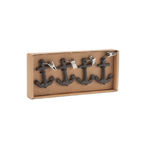 Set of four metal anchor tablecloth weights in packaging on a white background