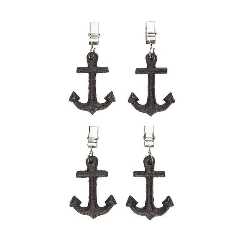 Four black anchor-shaped tablecloth weights on a white background