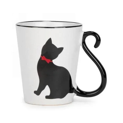 White mug with black cat silhouette and red bow on a white background