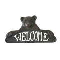 Cast iron bear decor with "Welcome" text on a white background.