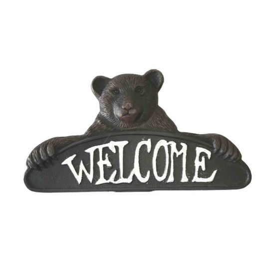 Cast iron bear decor with "Welcome" text on a white background.