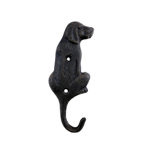 Black cast iron dog-shaped wall hook on a white background