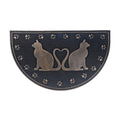 Decorative doormat with cat design and paw prints on a white background