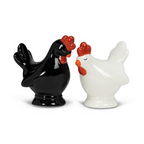 Black and white rooster-shaped salt and pepper shakers on a white background