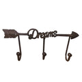 Decorative home metal wall hook with 'Dreams' text on a white background.