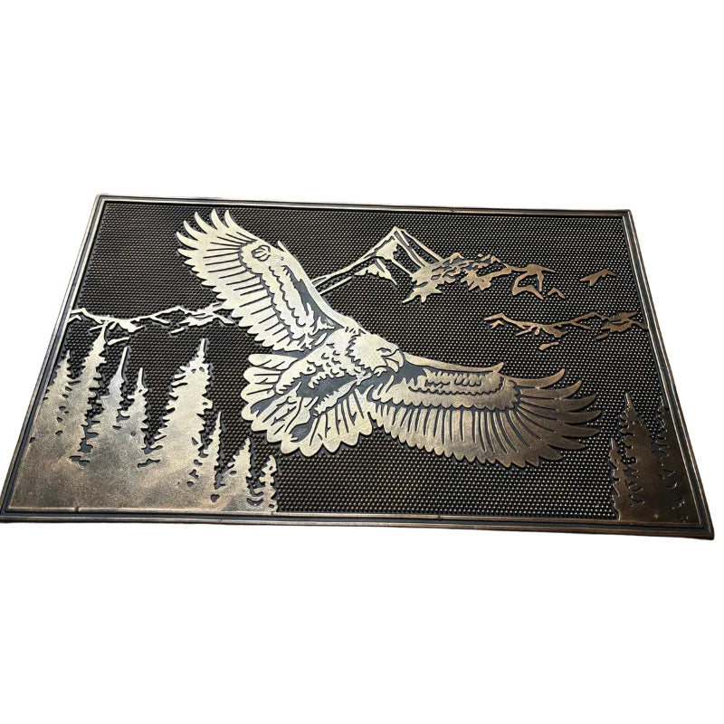 Decorative doormat with an eagle design on a white background