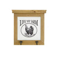Wooden wall hook with 'Life is Better on the Farm' and chicken illustration