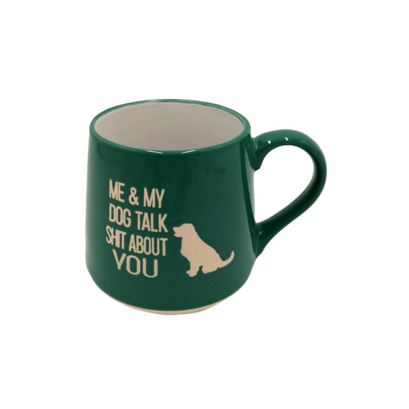 Green mug with text and dog silhouette on a white background