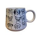 White ceramic mug with black dog illustrations on a white background