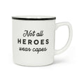 White mug with black interior and handle, featuring the text 'Not all heroes wear capes' on a white background.