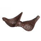 Decorative brown bird-shaped key keeper on a white background