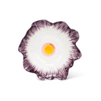 Floral-patterned dish with a yellow center on a white background