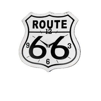 Route 66 sign on a brick wall with a red vehicle and fan in the foreground.