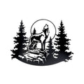 Metal wall decor of a wolf howling at the moon with trees in the background