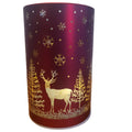 Decorative cylindrical container with reindeer and snowflake design on a red background