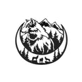 Black and white illustration of a wolf with mountains and trees in a circular design.